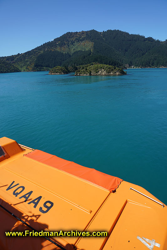 tourist,attraction,holiday,vacation,new zealand,ship,boat,lifeboat,orange,blue,